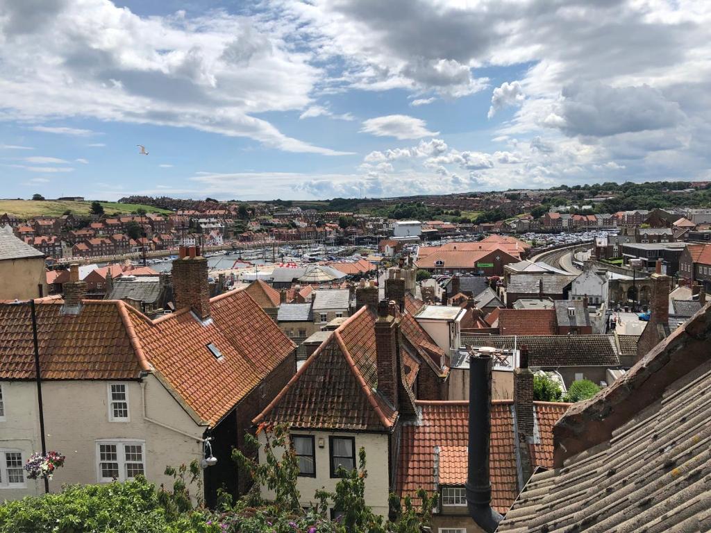 a view of a city with roofs at The Little Angel in Whitby