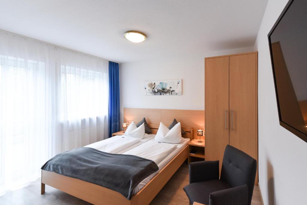 Postel nebo postele na pokoji v ubytování Gasthof Kolb