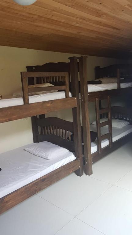 Voodi või voodid majutusasutuse Hostal Hilltop Salento toas