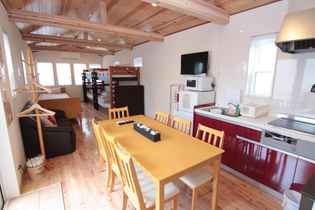 a kitchen and dining room with a table and chairs at BATH B / Vacation STAY 54888 in Beppu