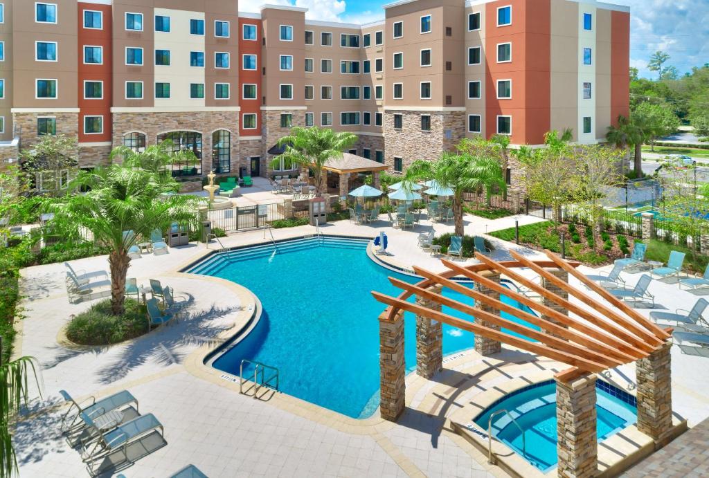 an image of a pool at a resort at Staybridge Suites - Gainesville I-75, an IHG Hotel in Gainesville