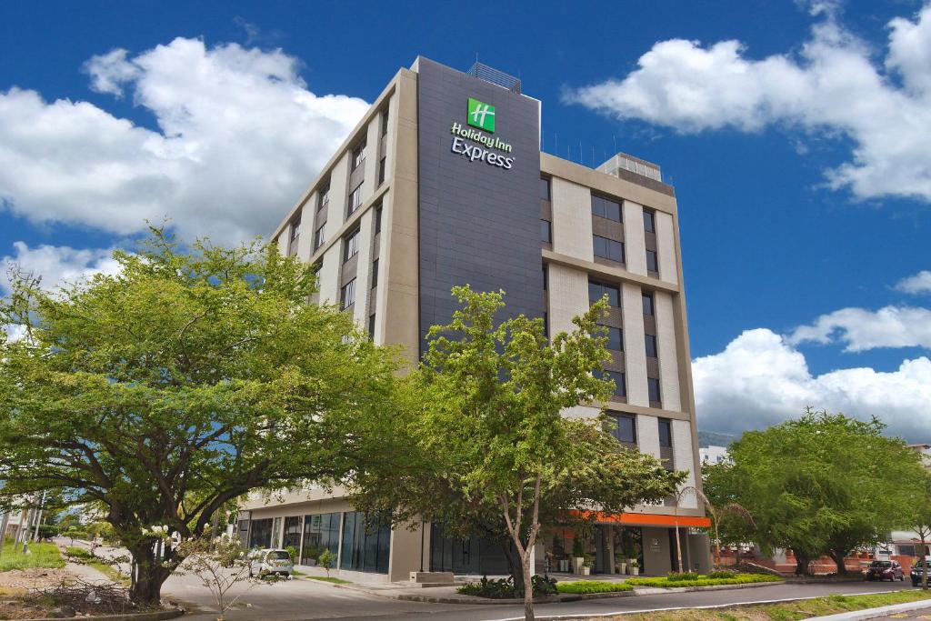 a building with a sign on the side of it at Holiday Inn Express Yopal, an IHG Hotel in Yopal