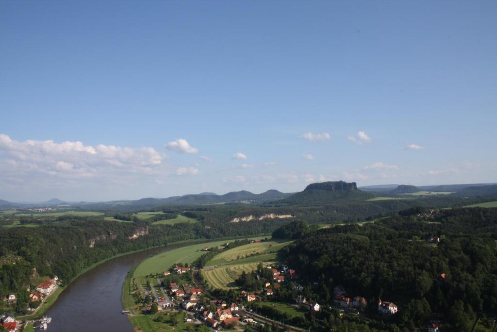 an aerial view of a river and a village at Hotel Indigo Dresden - Wettiner Platz by IHG in Dresden