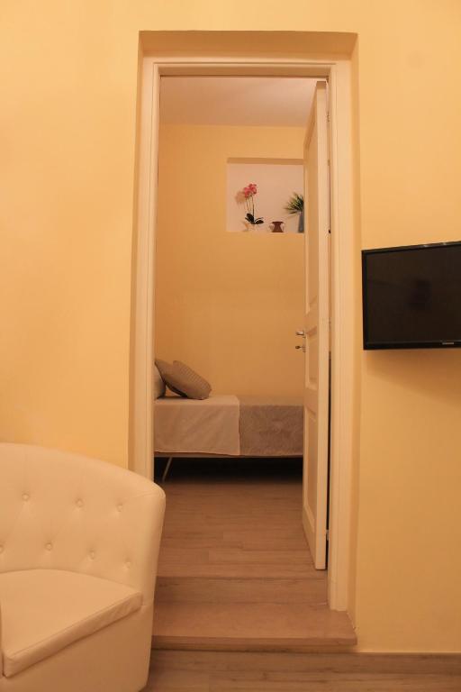 A television and/or entertainment centre at Arco Suite
