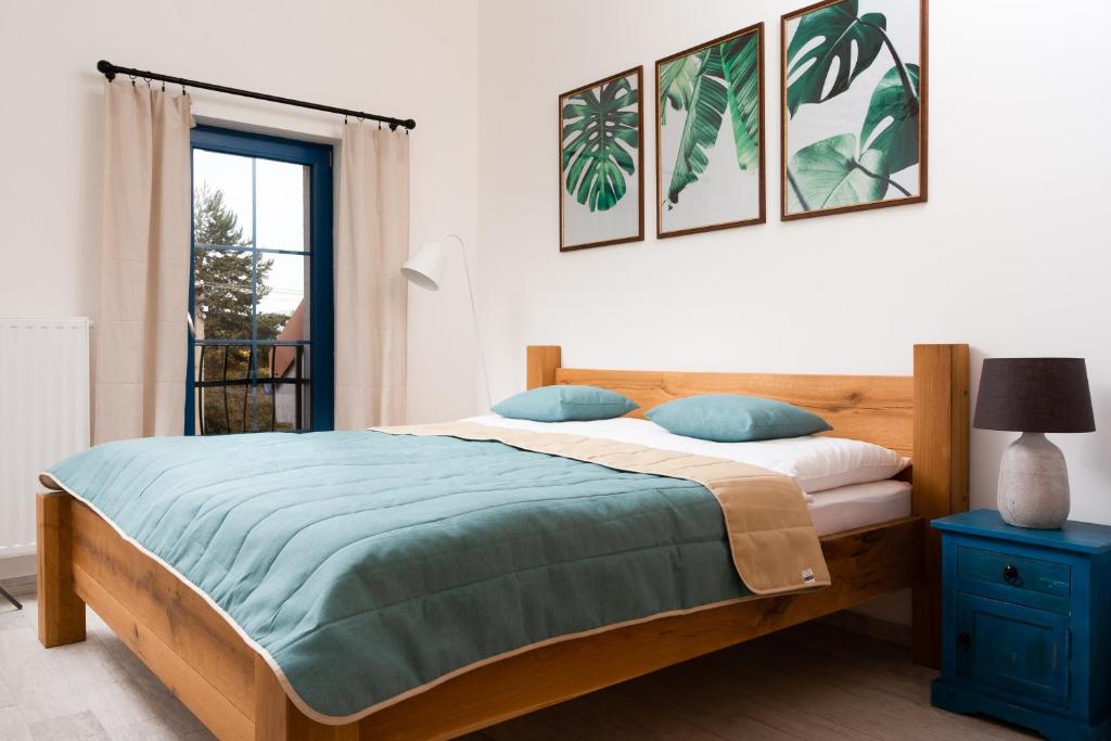 Postel nebo postele na pokoji v ubytování BURINA residence