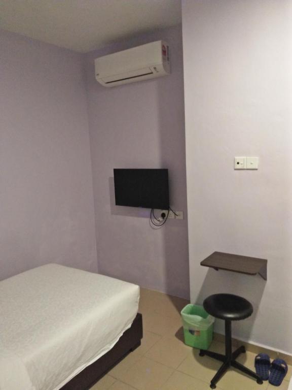 TV a/nebo společenská místnost v ubytování TIONG HUA HOTEL