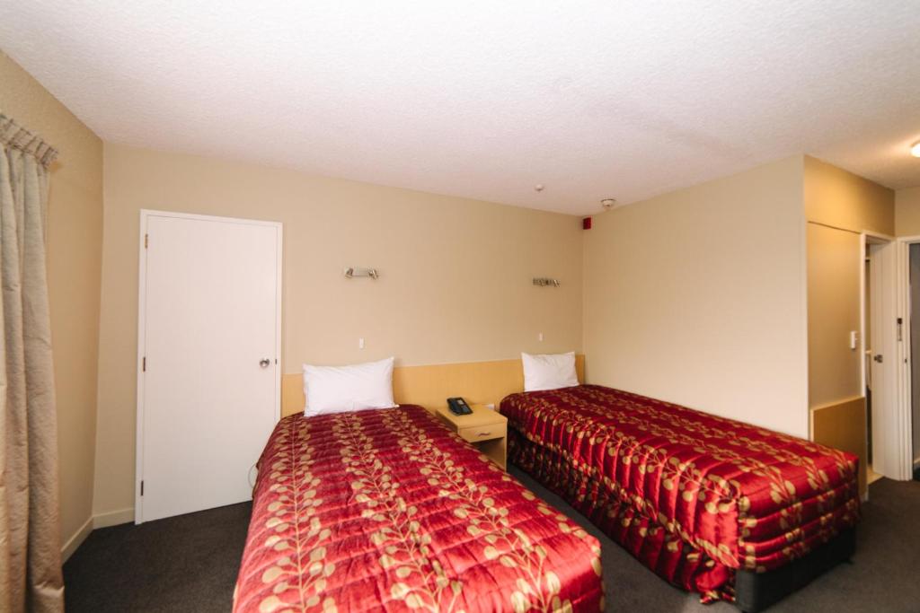Postel nebo postele na pokoji v ubytování Brydone Hotel Oamaru