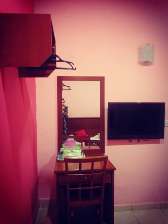 TV a/nebo společenská místnost v ubytování Weng Kong Homestay