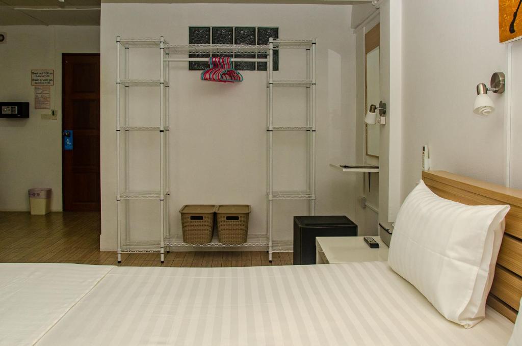 Postel nebo postele na pokoji v ubytování Allstar Guesthouse