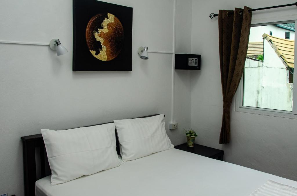 Postel nebo postele na pokoji v ubytování Allstar Guesthouse