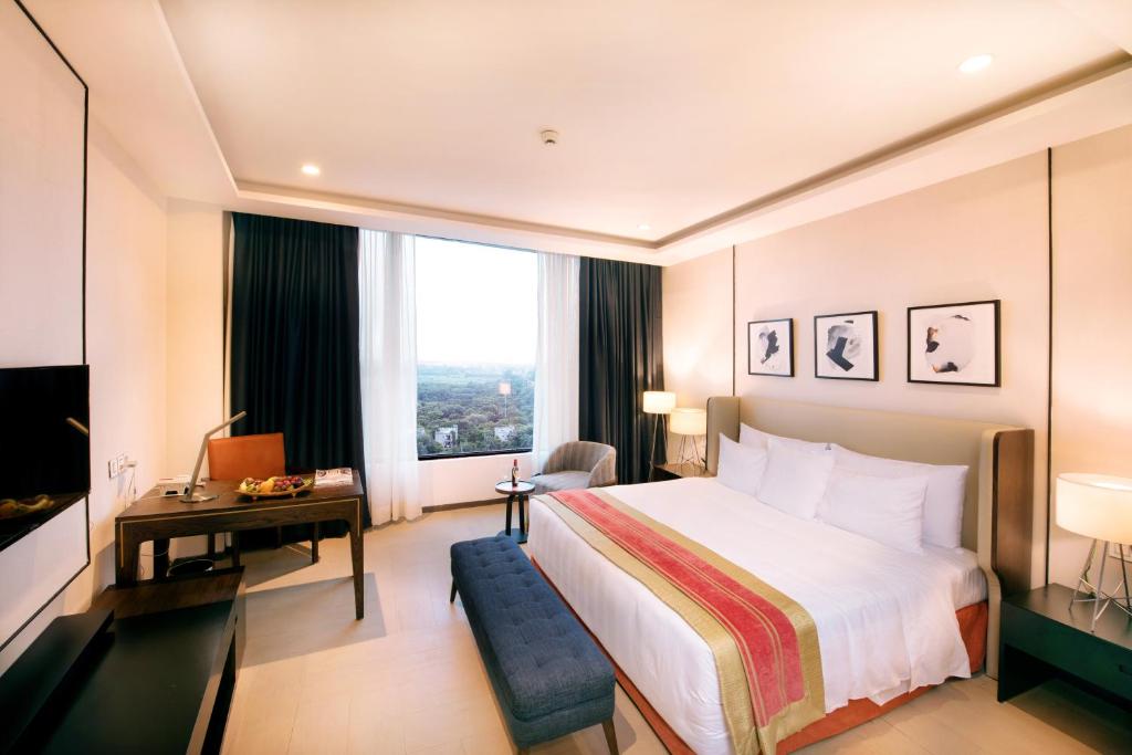 Postel nebo postele na pokoji v ubytování Welcomhotel by ITC Hotels, Dwarka, New Delhi