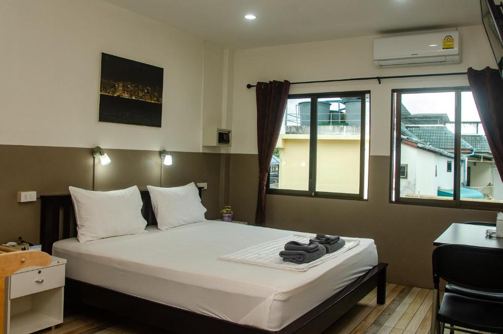Postel nebo postele na pokoji v ubytování Allstar Guesthouse