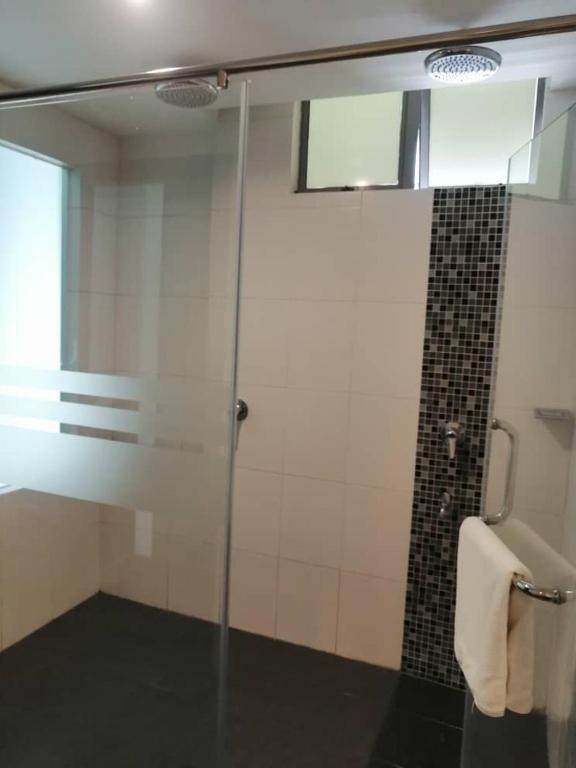 Koupelna v ubytování Manja Hotel