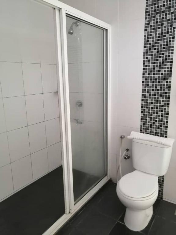 Koupelna v ubytování Manja Hotel