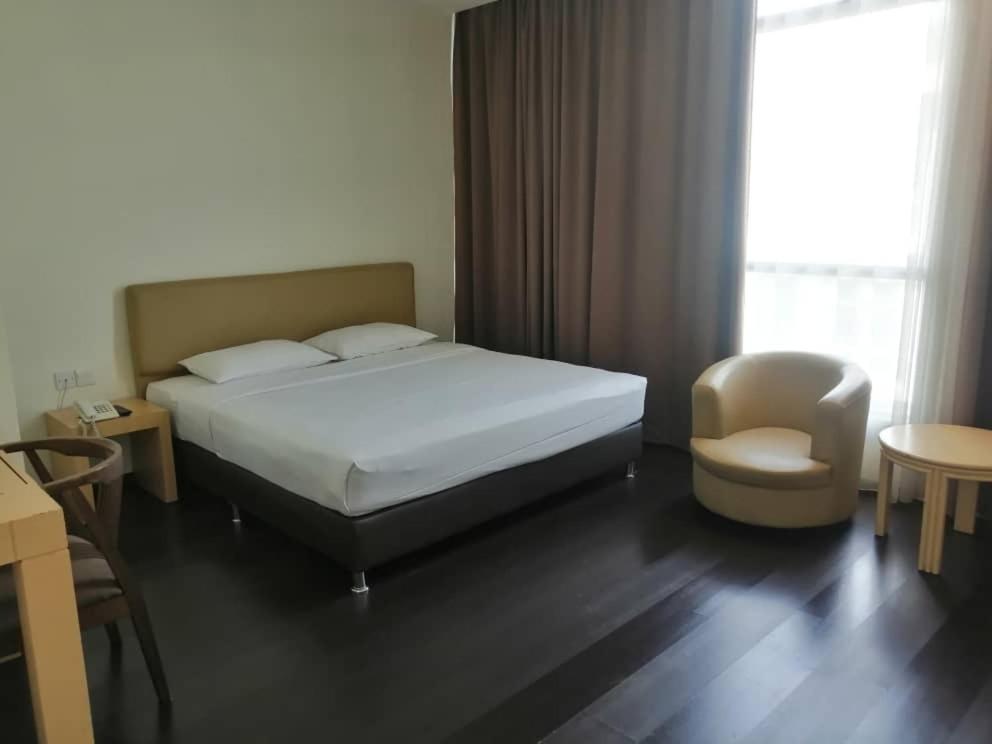 Postel nebo postele na pokoji v ubytování Manja Hotel
