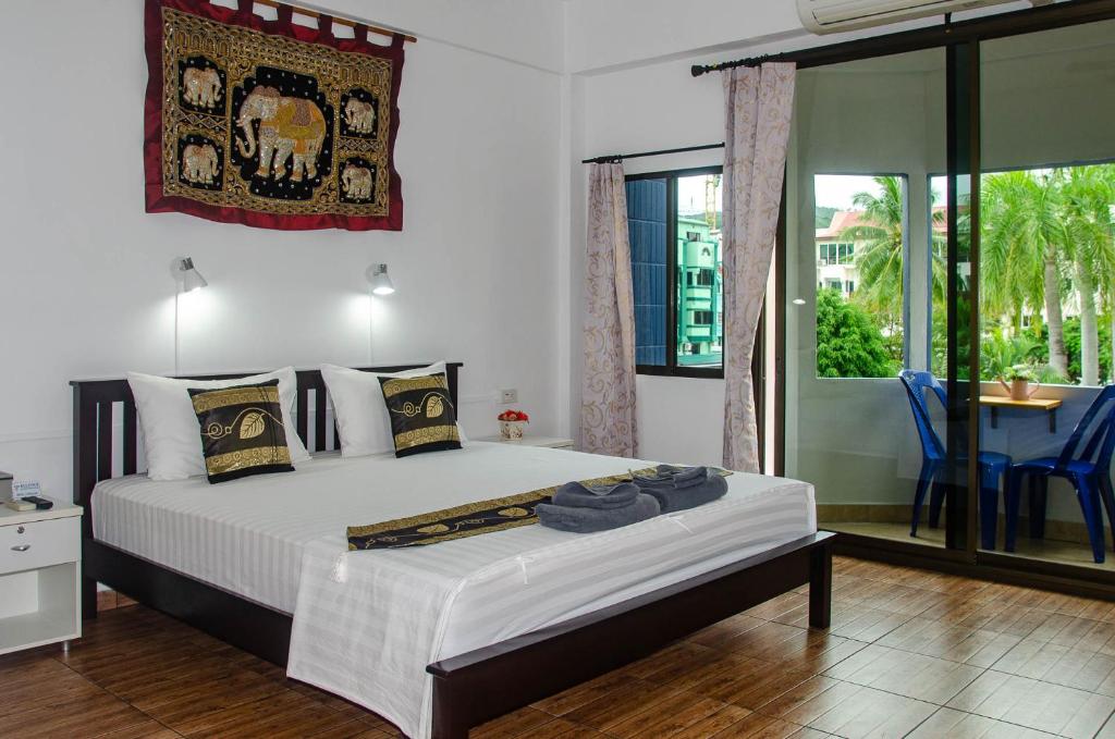 Postel nebo postele na pokoji v ubytování Allstar Guesthouse