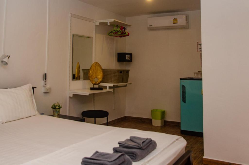 Postel nebo postele na pokoji v ubytování Allstar Guesthouse