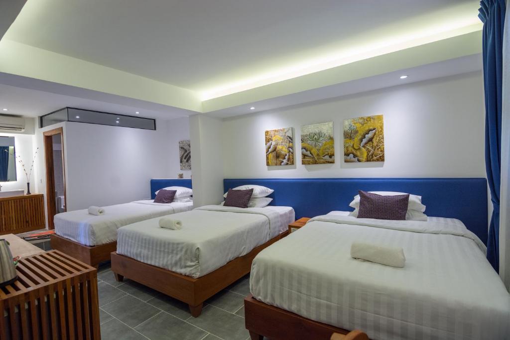 Postel nebo postele na pokoji v ubytování Neth Socheata Hotel
