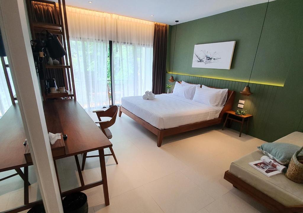 Postel nebo postele na pokoji v ubytování Mini House Aonang Hotel SHA Plus