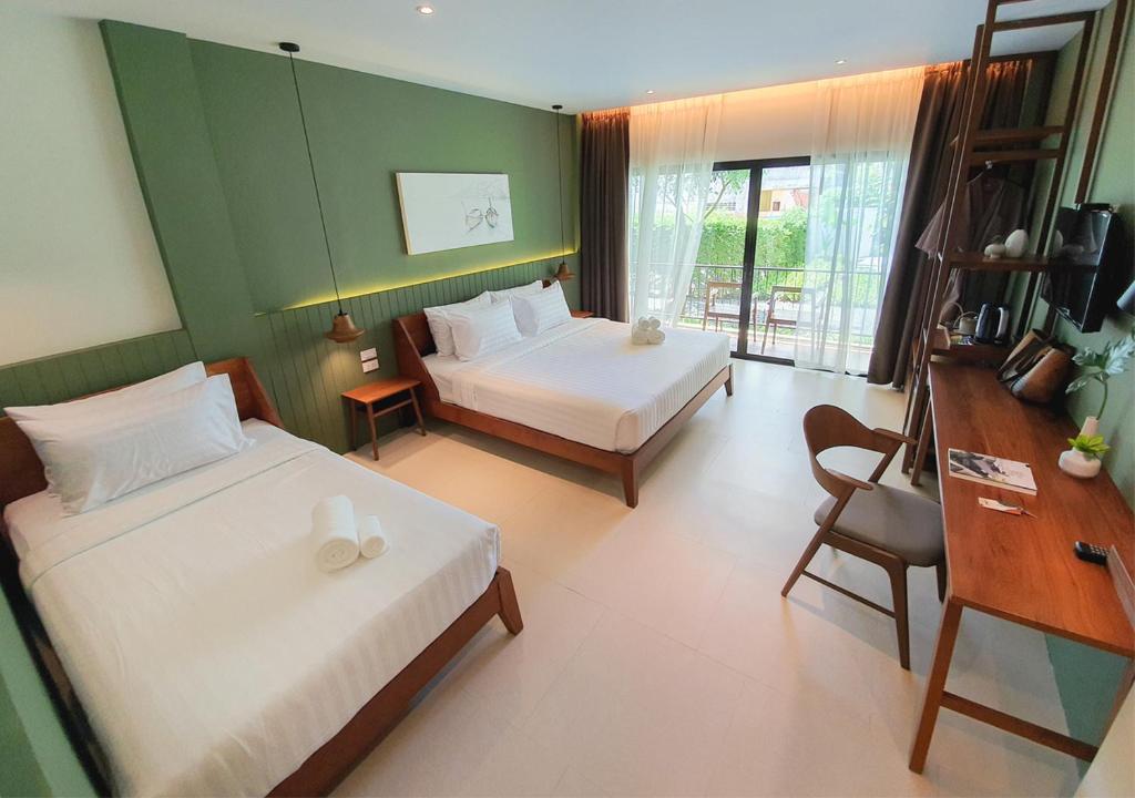 Postel nebo postele na pokoji v ubytování Mini House Aonang Hotel SHA Plus
