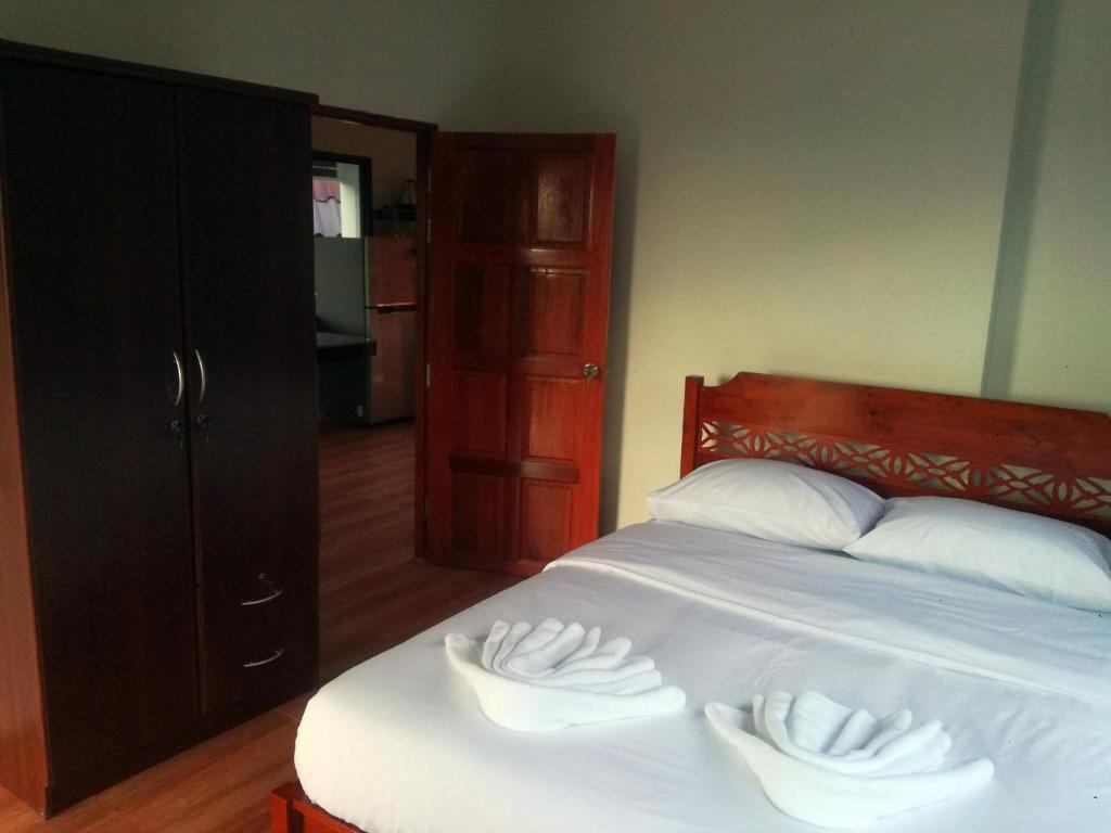Postel nebo postele na pokoji v ubytování Koh Samui Palm View Villa