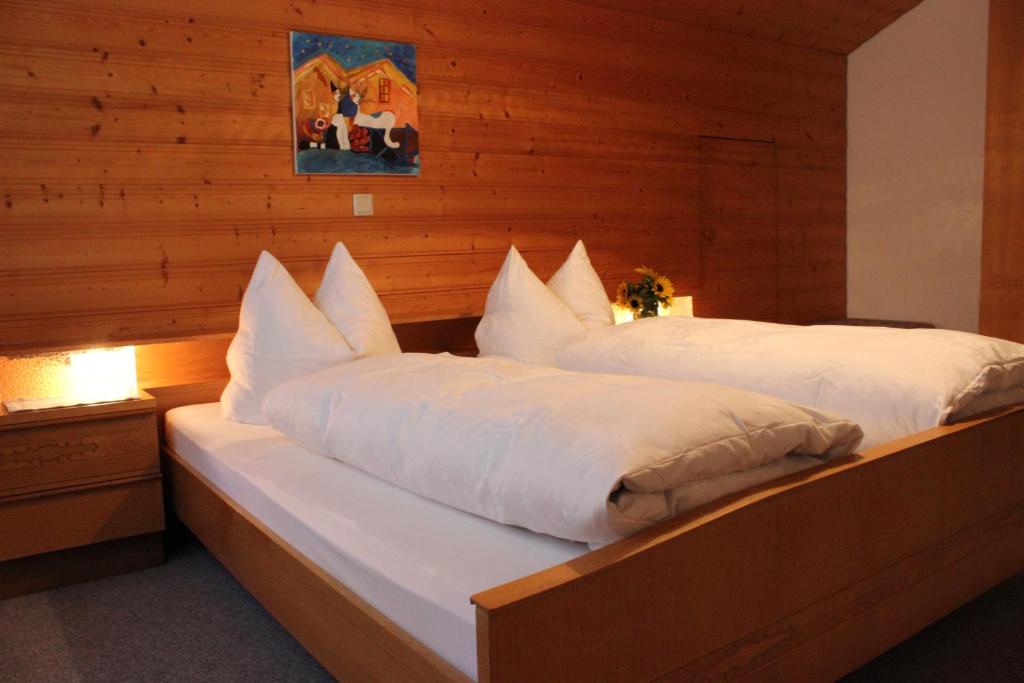 Postel nebo postele na pokoji v ubytování Haus Simma
