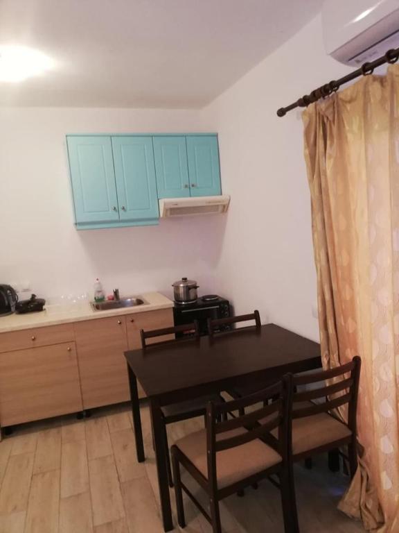 Kuchnia lub aneks kuchenny w obiekcie Gouvia House Luxury Apartments