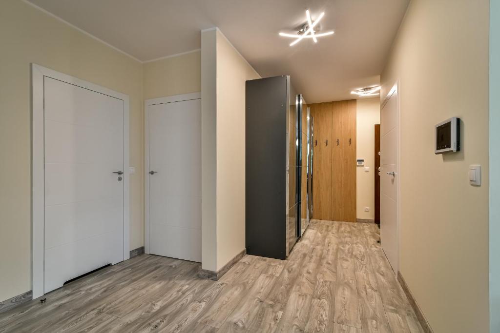 Televízia a/alebo spoločenská miestnosť v ubytovaní Małe Orłowo LTC - Apartments