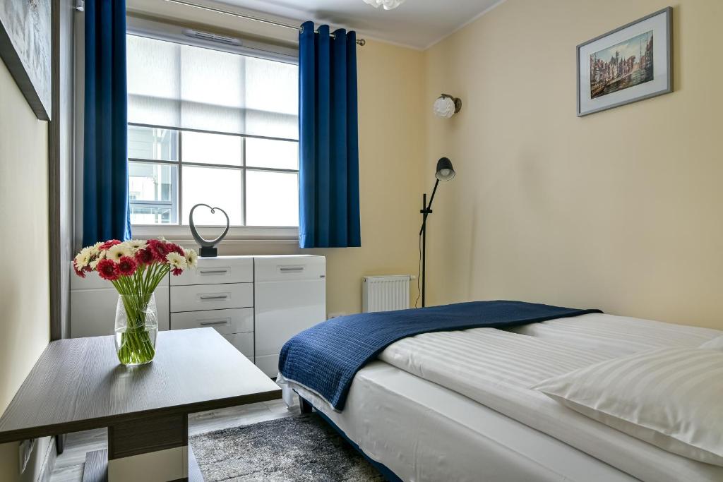 Posteľ alebo postele v izbe v ubytovaní Małe Orłowo LTC - Apartments