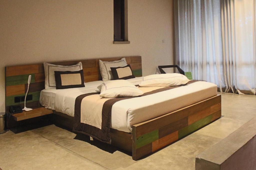 Postel nebo postele na pokoji v ubytování SWP Eco Lodge