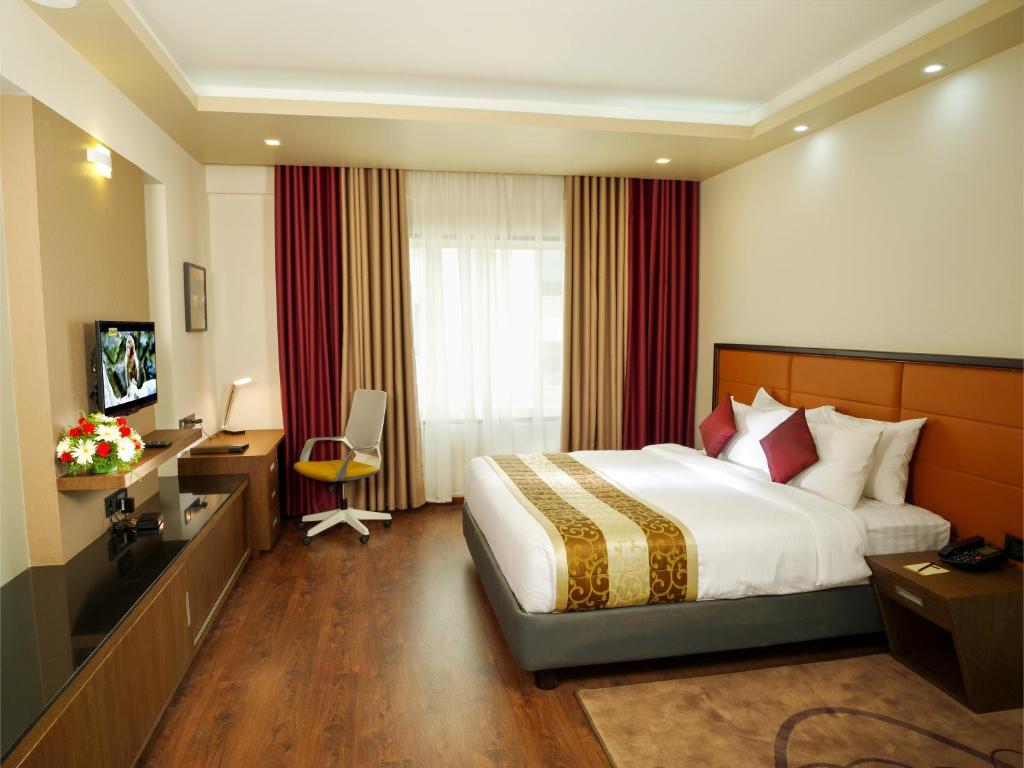 Postel nebo postele na pokoji v ubytování Dimora Hotels And Resorts