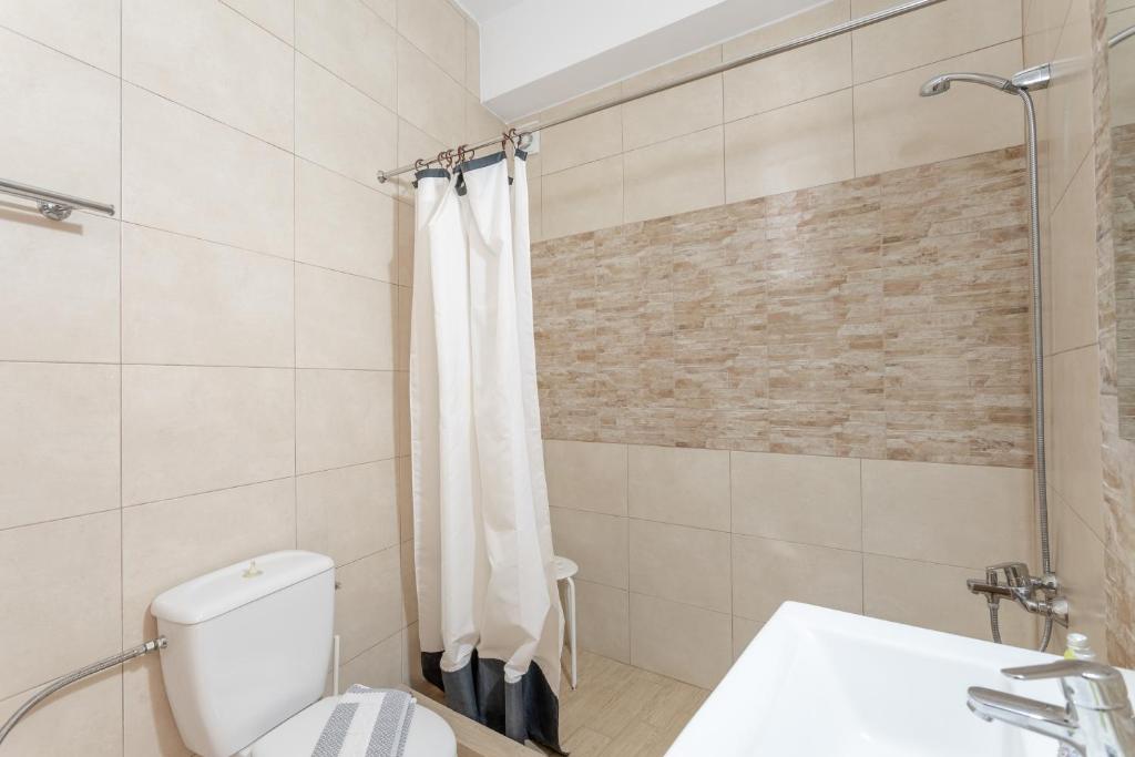 Koupelna v ubytování Orion Residence Mani