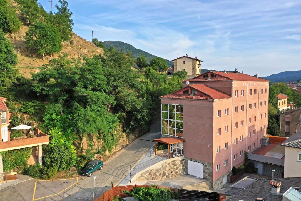 an aerial view of a building on a mountain at La Trobada Hotel Sport in Ripoll