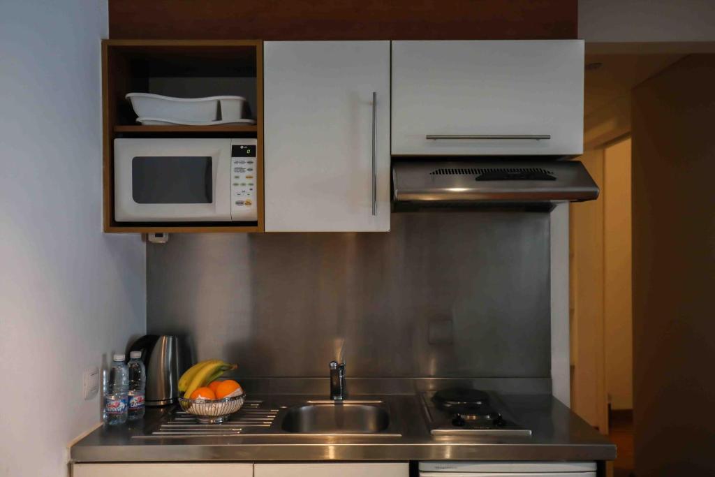 Kuchyň nebo kuchyňský kout v ubytování Sky Suites