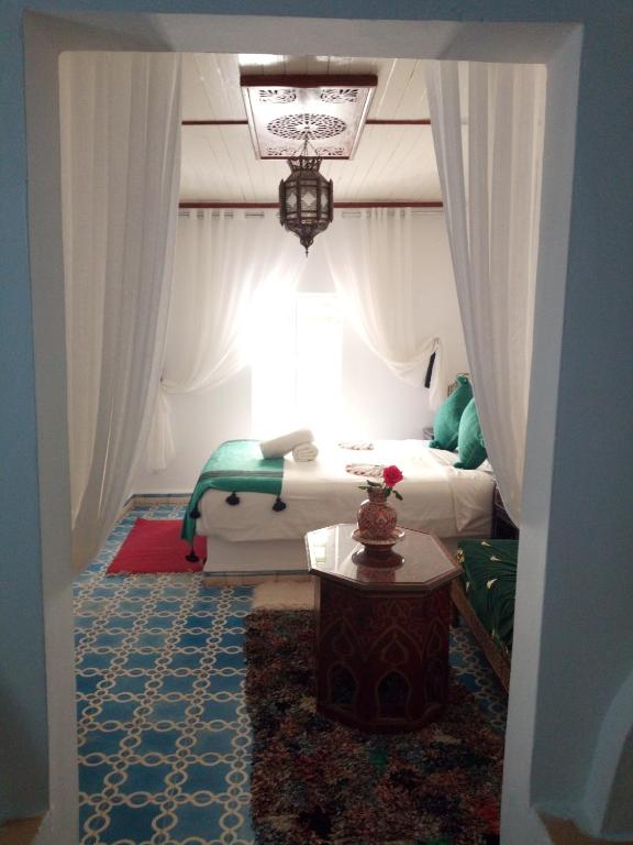 Postel nebo postele na pokoji v ubytování Riad Etoile De Mogador