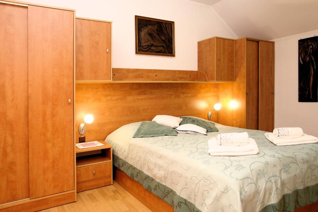 Postel nebo postele na pokoji v ubytování Apartamenty Solar