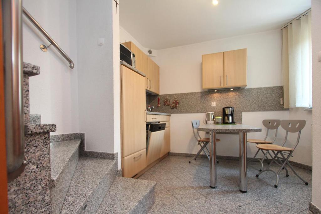 Kuchyň nebo kuchyňský kout v ubytování Apartamenty Solar