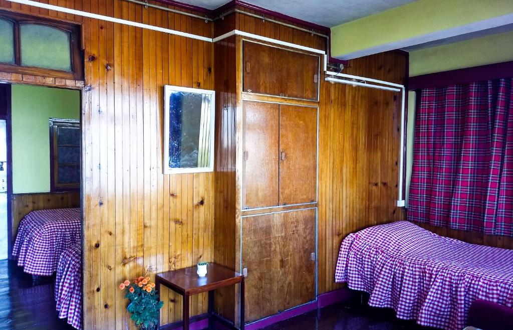 Postel nebo postele na pokoji v ubytování West Point Backpackers Hostel