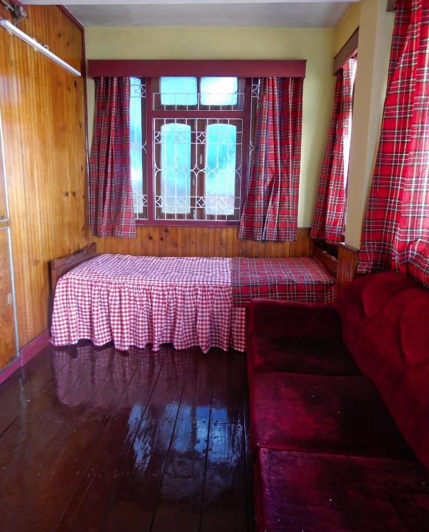 Postel nebo postele na pokoji v ubytování West Point Backpackers Hostel