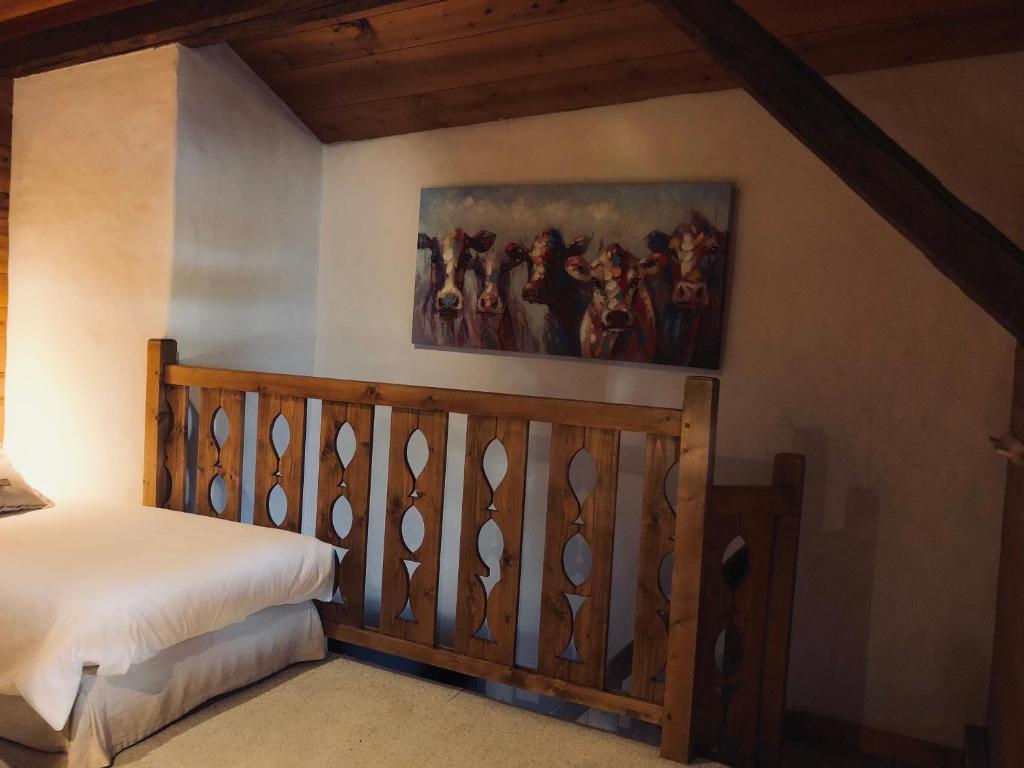 Postel nebo postele na pokoji v ubytování Le Coin Savoyard