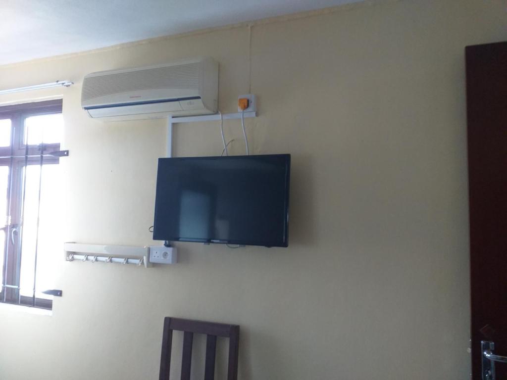 TV a/nebo společenská místnost v ubytování Tyvabro Guesthouse