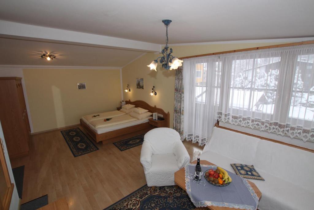Postel nebo postele na pokoji v ubytování Hotel Sonne