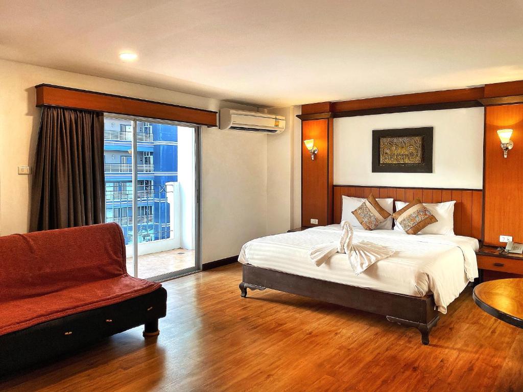 Vuode tai vuoteita majoituspaikassa Siam View Hotel and Residence