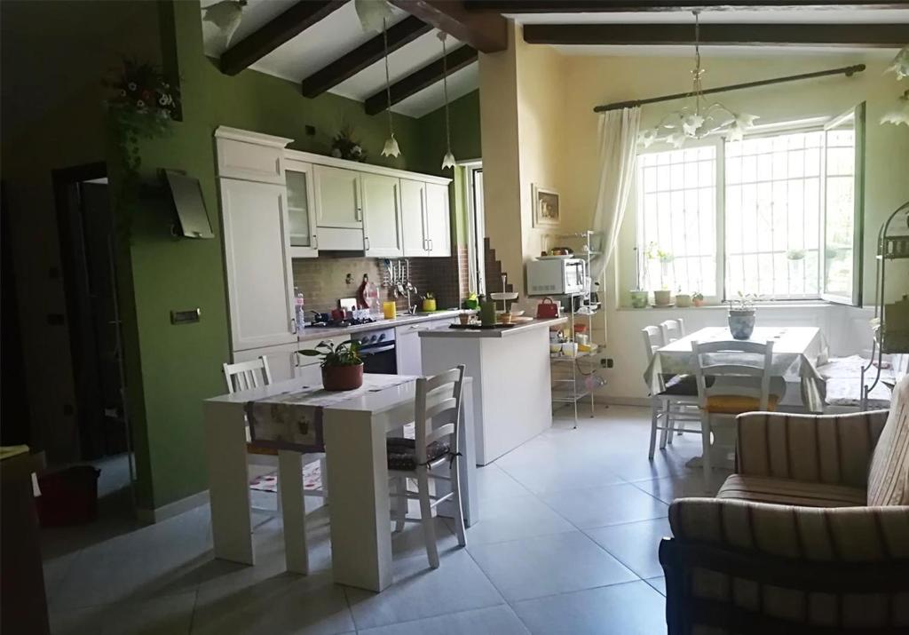 Kuchyň nebo kuchyňský kout v ubytování B&B Arcobaleno