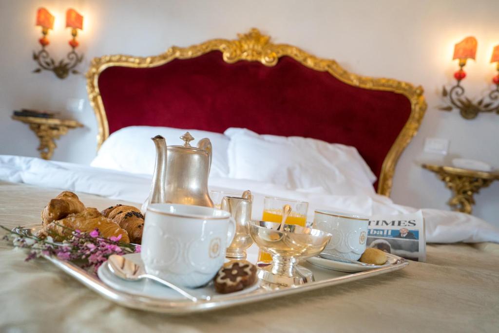 Hotel Bel Sito e Berlinoにあるベッド