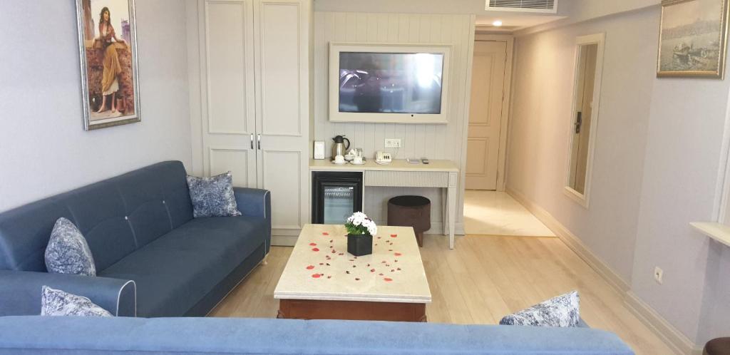 TV a/nebo společenská místnost v ubytování Martinenz Hotel