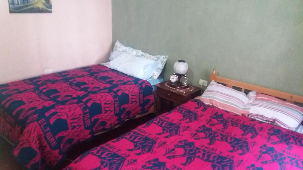 Postel nebo postele na pokoji v ubytování Casa Mirita