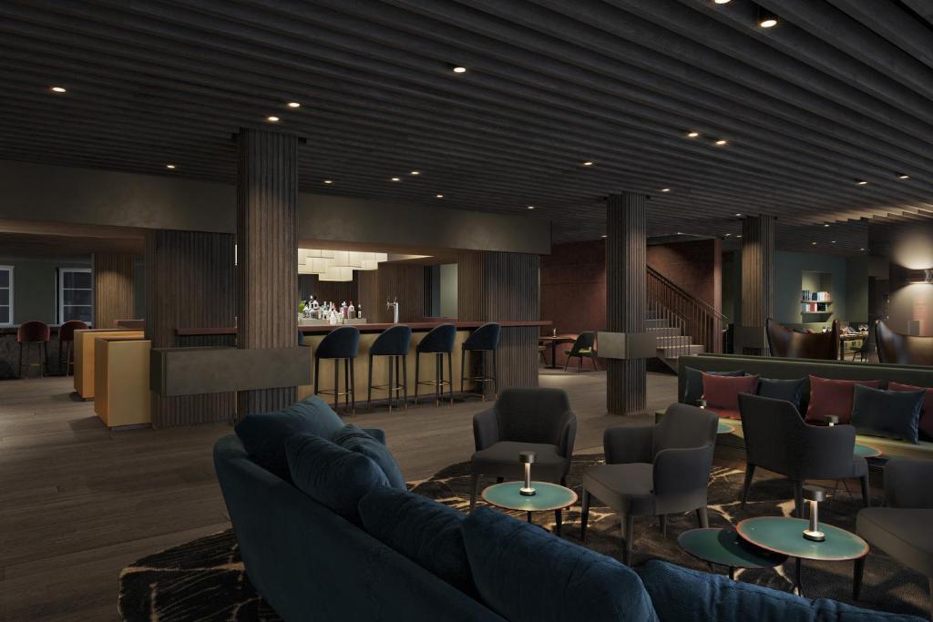 Posezení v ubytování Hotel Weisses Roessl