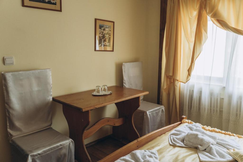 Postel nebo postele na pokoji v ubytování Турянська долина