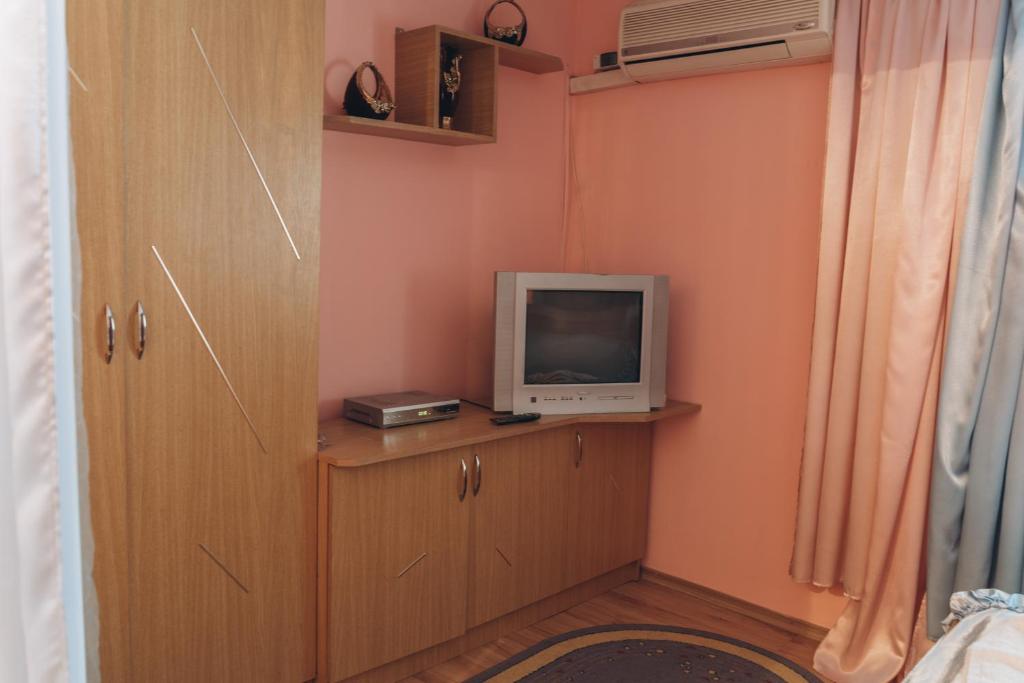 TV a/nebo společenská místnost v ubytování Турянська долина